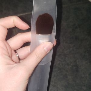 Liquid foundation and large concealer brush makeup